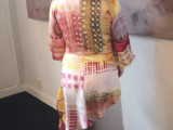 Colorful tunic for artsy bride